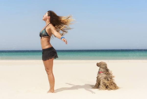 Photograph Ben Welsh Woman And Rasta Dog on One Eyeland