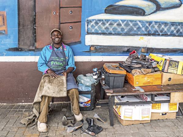 Photograph Aasmund Kvarnstrom Gilbert The Shoe Repairman on One Eyeland
