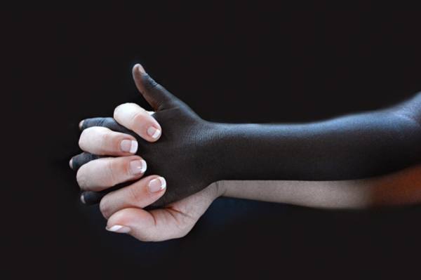 Photograph Michele Taras Loving Hands on One Eyeland
