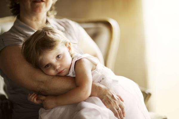 Photograph Jim Erickson Mother Holding Toddler on One Eyeland