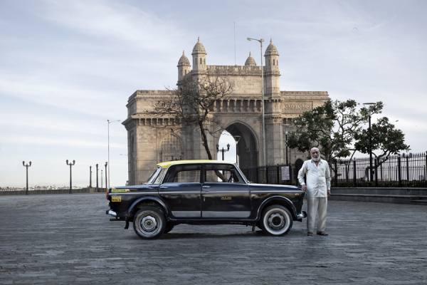 Photograph Markku Lahdesmaki Mumbai Taxi Company Number 106 on One Eyeland