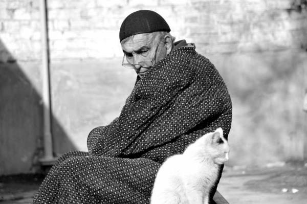 Photograph Ara Manuk Uzbek Man And A Cat on One Eyeland