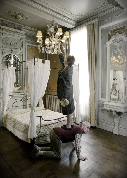 Photograph Geert De Taeye Cleaning Couple on One Eyeland