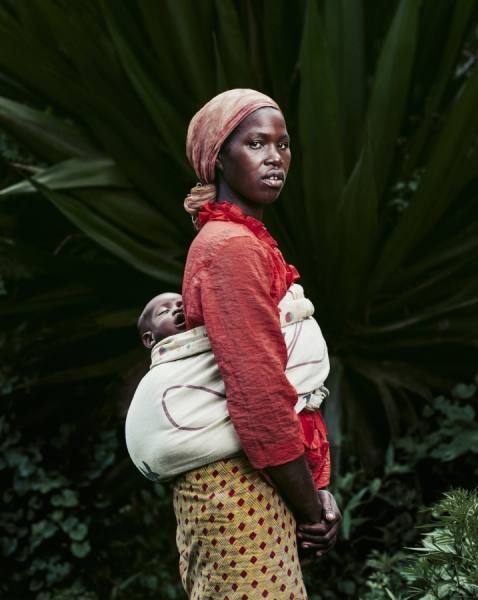 Photograph Tim Coburn Woman With Child In Rwanda on One Eyeland