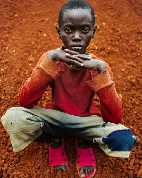 Photograph Tim Coburn Boy In Rwanda on One Eyeland