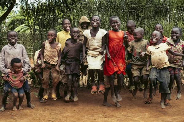 Photograph Tim Coburn Jumping Children In Rwanda on One Eyeland
