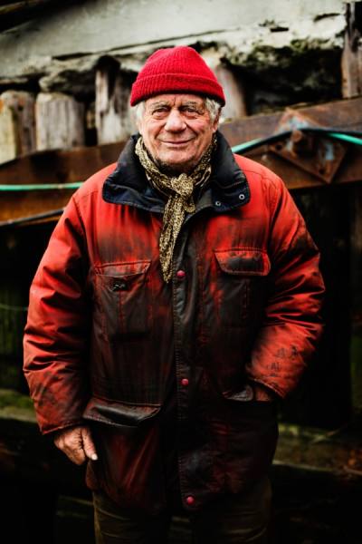 Photograph Laura Barisonzi Fisherman In Red on One Eyeland