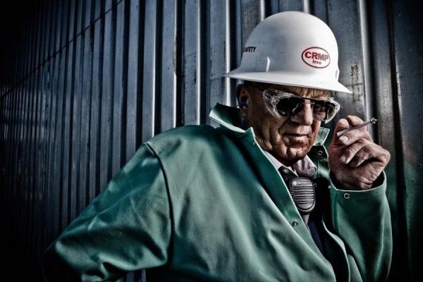 Photograph Andy Goodwin Smoking Steel Worker on One Eyeland