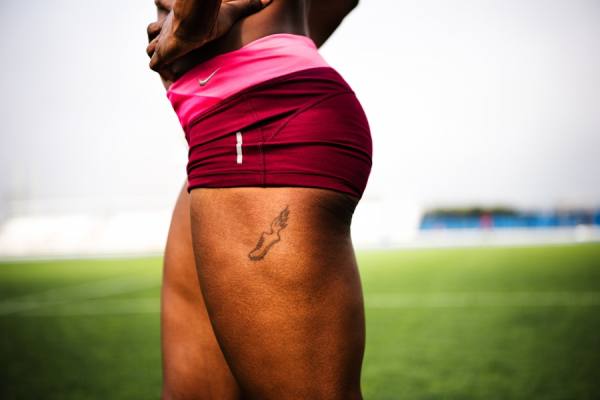 Photograph Laura Barisonzi Runner Tattoo on One Eyeland
