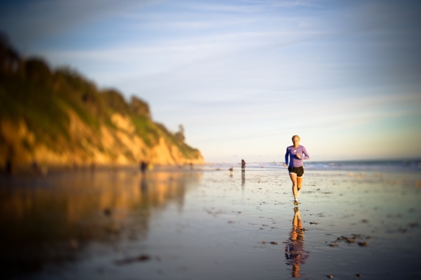 Photograph Kevin Steele Running Empty Beach on One Eyeland