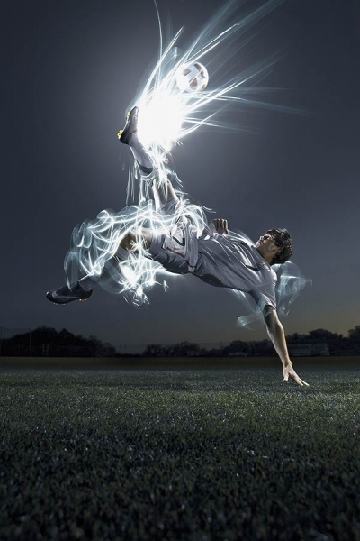 Photograph Fedele Studio Soccer Player With Light Painting on One Eyeland