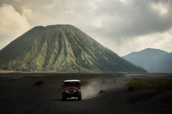 Photograph Chris Konig Driving Between Volcanoes In Indonesia on One Eyeland