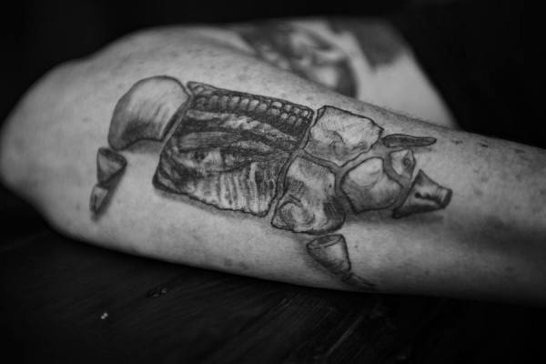 Photograph Dennis Welsh How To Butcher A Pig Tattoo on One Eyeland