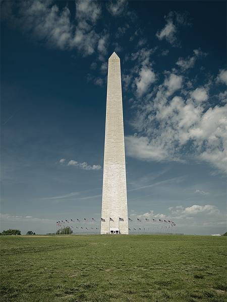 Photograph Jackson Carvalho The Monument And The Flags on One Eyeland