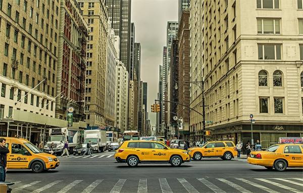 Photograph Jackson Carvalho Yellow Cabs on One Eyeland