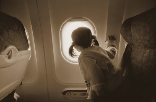 Photograph John Wagner Girl On Plane on One Eyeland