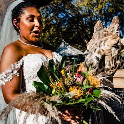 Giraffe Eating Bouquet-Darien Chui-bronze-wedding-4730